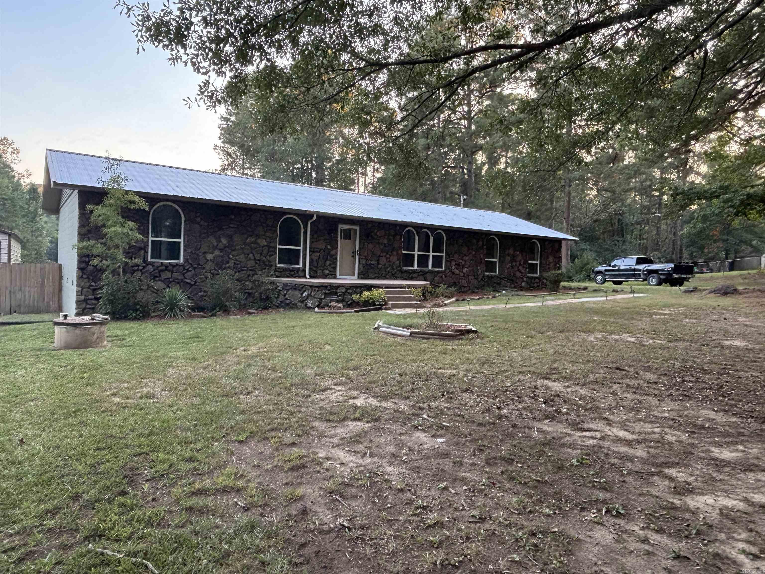 This beautifully remodeled and renovated home is in a Rural Development area & qualifies for 100% financing! Every inch of this home has been renovated! Featuring new paint, both inside and out, Brand New appliances, HVAC, Garage is heated & cooled, Granite countertops throughout, Metal roof, new windows and doors with fenced in back yard. This Amazing location offers quiet country living with a country feel, but is only a short drive to town!