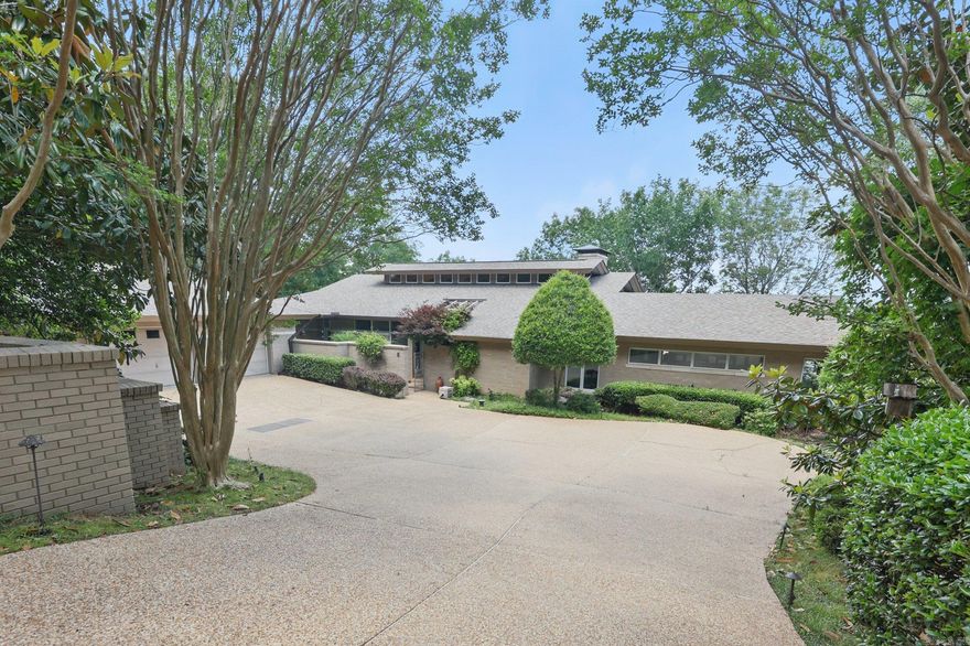 Set high above the Arkansas River, this beautifully design soft contemporary home offers expansive, unobstructed views of the river from the I-430 bridge to the iconic Big Dam Bridge. Clean lines, natural textures, and warm neutral tones define the aesthetic, creating a perfect balance of comfort and sophistication. The open living room is bathed in natural light with floor-to-ceiling windows that continue into the large dining area that is perfect for entertaining. The kitchen and breakfast area offer more breathtaking views of the river with a private screened porch and deck, perfect for enjoying all of the beauty that nature has to offer. Retreat to the luxurious primary suite where you will wake every morning to river views. The primary suite includes a hot tub room, gym, craft room, and private deck. Tucked away from the main living areas, a private office blends functionality and style with custom built-ins and a Murphy bed with a full bathroom across the hall. The lower level features a den/family room, 3 large bedrooms, and two full bathrooms. Additional features include large 3 car garage with workshop and storage, home generator, and central vacuum. See Agent Remarks