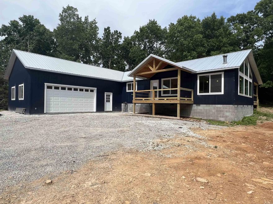 Brand NEW Construction with 4 BR, 3 BA, 1,920 SQFT, CH&A, 2 car garage, 2 covered porches, and 3.50 wooded acres m/l. The home features a large great room with wood stove, two jetted tubs, cathedral ceilings, large windows, metal roof, rural water, private master bedroom deck, and over sized garage. If you are looking for a new home with land this is one you ought to take a look at. Schedule a viewing today!