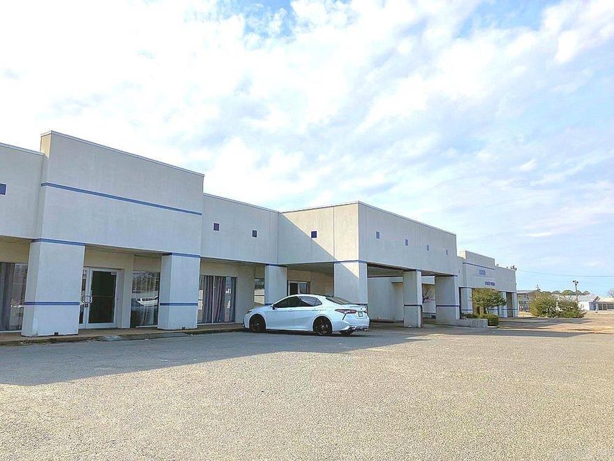 Two commercial buildings for sale (side by side).  2500 E Harding has 14,192 square feet including a large showroom plus an extensive service area.  2502 E Harding has 9,853 square feet which is mostly office space. The paved lot has parking for around 100 vehicles.    Harding Avenue has a high traffic count and is conveniently located near I-530. There is an additional showroom for sale next door, with additional parking dealers with a lot of inventory.    Owner financing will be considered with 50% down.  These buildings have great potential to provide a positive cash flow while building equity.