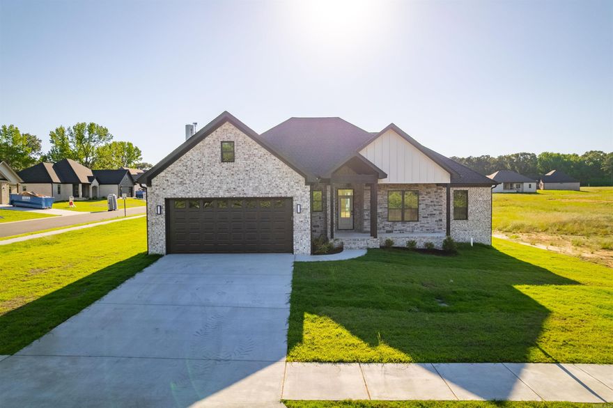 Welcome to style & elegance in this 2025 New Construction! Approaching the home you notice the stained front porch ceiling & solid 6x6 posts creating an instant feel of charm and rugged elegance. Entering the home you step into the foyer greeted by the spacious living room accenting the ultra open concept of this stunning home! Immediately you notice the custom blend of lights and darks with subtle hints of rugged style like the blonde beams in the living room, custom fireplace trim, and the perfectly accented ventahood. The large kitchen w/hidden pantry + large bar top island allows for entertaining guests and convenient family nights. Just off the kitchen is the dining / breakfast area. This home boasts a split floor plan with guest bedrooms on the right and the master bedroom and custom master bath on the left - go see this bathroom! The home boasts a spacious laundry & mud room too! Enjoy covered front & back porch time with this home too! The home has tile and luxury vinyl & hybrid laminate throughout the home. Also, Seller is offering $5K in Buyers Concessions too so do not delay! Projected equity in the home so discuss options if interested in a fence! See Agent Remarks.