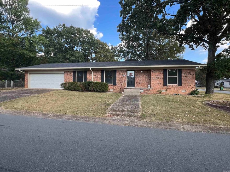 Great Opportunity to be close to everything. This home has 3 bedroom and 1.5 bath  with a living area and a den with a great Fireplace. Home is on a corner lot with nice adult trees. Some updates recently done are a new roof, new paint, new LVP flooring. There is an outdoor building that conveys as well as an attached storage room. Move in Ready  AGENTS PLEASE READ CONFIDENTIAL REMARKS