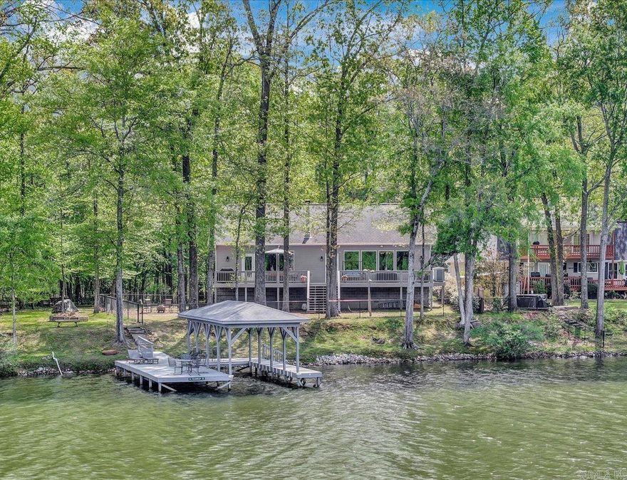 This wonderful lakefront home in the Diamondhead community offers peaceful, serene living with stunning water views and direct lake access. Featuring 3 bedrooms and 2 baths, the open layout is filled with natural light and designed for comfort. A private covered boat slip makes lake days effortless, while the quiet setting creates the perfect retreat. Enjoy the best of lake life with the added bonus of golf and community amenities just moments away along with the Lakeside School System.