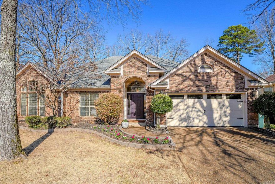 Welcome to this nicely positioned home in the desirable Charleston Heights neighborhood of West Little Rock.  This home features updates throughout including quartzite countertops, updated bathrooms, hardwood floors, new roof (2023), and new insulated garage door w/smart motor (2025).  Wonderful layout with plenty of room in the eat-in kitchen and dining room that flows conveniently into the large living area.  French doors lead out to the covered deck and rock patio perfect for relaxing on upcoming Spring evenings. The three bedrooms are oversized with the primary having a recently renovated en-suite with two walk in closets and soaking bathtub. Location is zoned for Don Roberts Elem. with easy access to major roadways in WLR.  Come see!