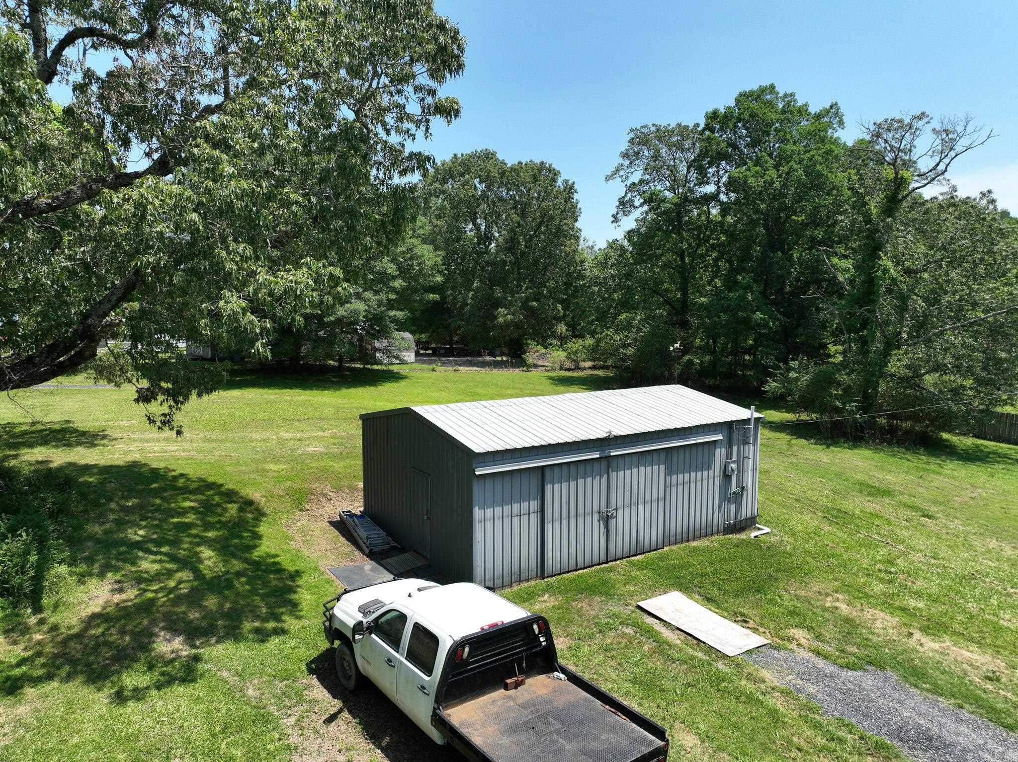 Large, Level 1.12-Acre Lot in Town ā Shop, Utilities, and RV Hookup! Donāt miss this versatile 1.12-acre lot in a convenient in-town locationājust minutes from McMillan Park! This spacious, level property comes equipped with a well-built shop featuring a half bath. The lot is already set up with a 50 AMP RV hookups, power, and internet serviceāmaking it ideal for future development. With its generous size and great location, this property offers endless possibilities for building and expanding.