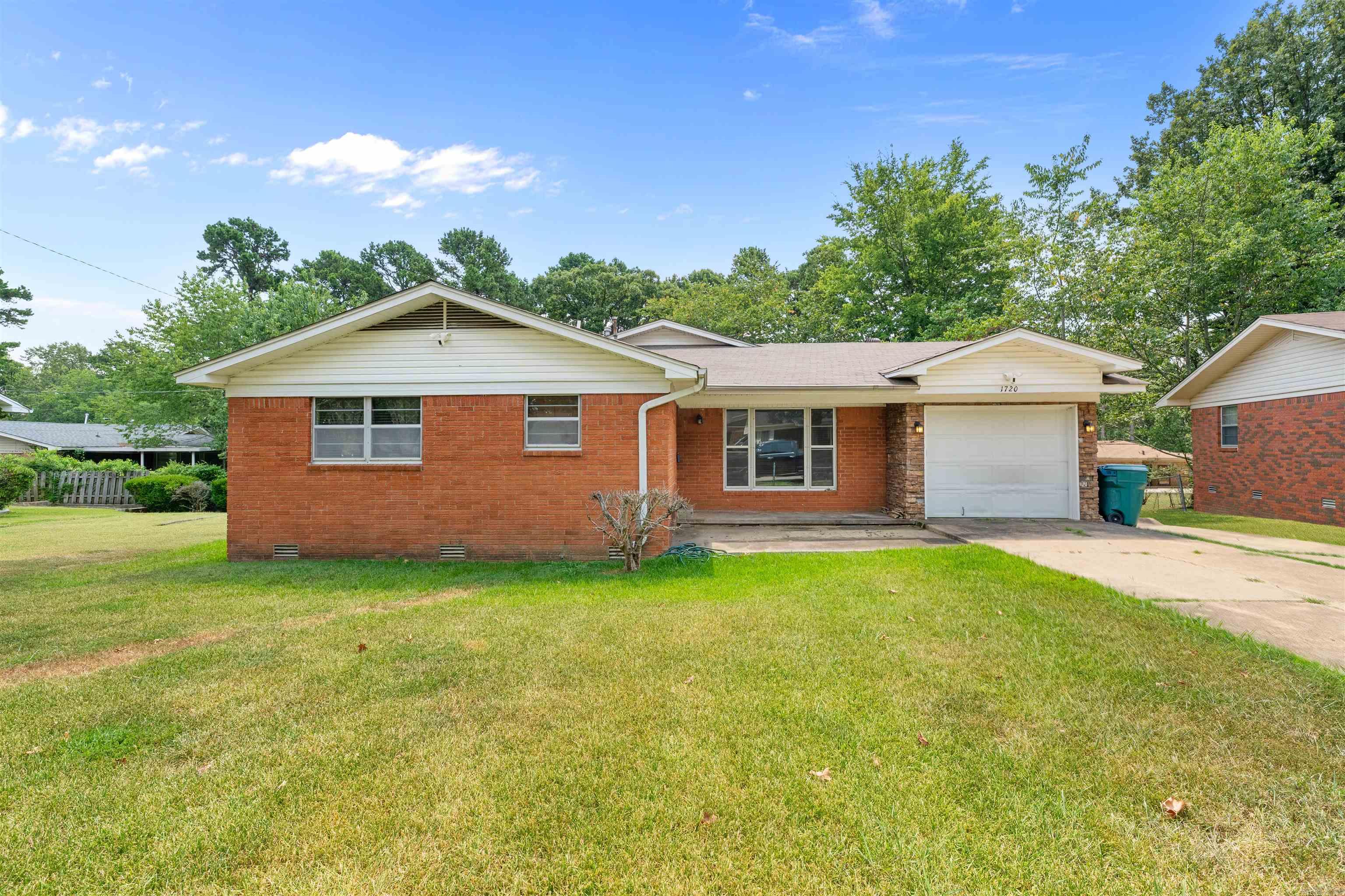 Looking for a great brick home in Twin Lakes with room for the whole family this 3 bedroom 3 full bath home features a 2023 roof,newer HVAC, Newer deck, an amazing professional home chef's updated kitchen with cabinets galore, granite countertops, spacious central island, causal dining eat in area,&real wood cabinets. The UPDATED Kitchen opens into huge family room with fireplace opens onto outdoor entertainment space. With a few personal preferred cosmetic additions, you can make it your very own. The Primary Suite opens into additional space which doubles the size of suite includes private bath with spa tub, newer hot water tank, so many features including lovely red oak hardwood floors. This lovely home boast two living spaces in addition to the laundry room and full bathroom off mud room area. Big backyard for all those family gatherings and a storage building too. All the space you need to make this your home sweet home. It also has a single car garage makes it convenient. Minutes away from Hospitals, Medical Clinics, and Cancer Centers. Easy access to the interstate highway system. (Agents See AGENT REMARKS) Schedule a tour today! Home is sold as is condition at closing.