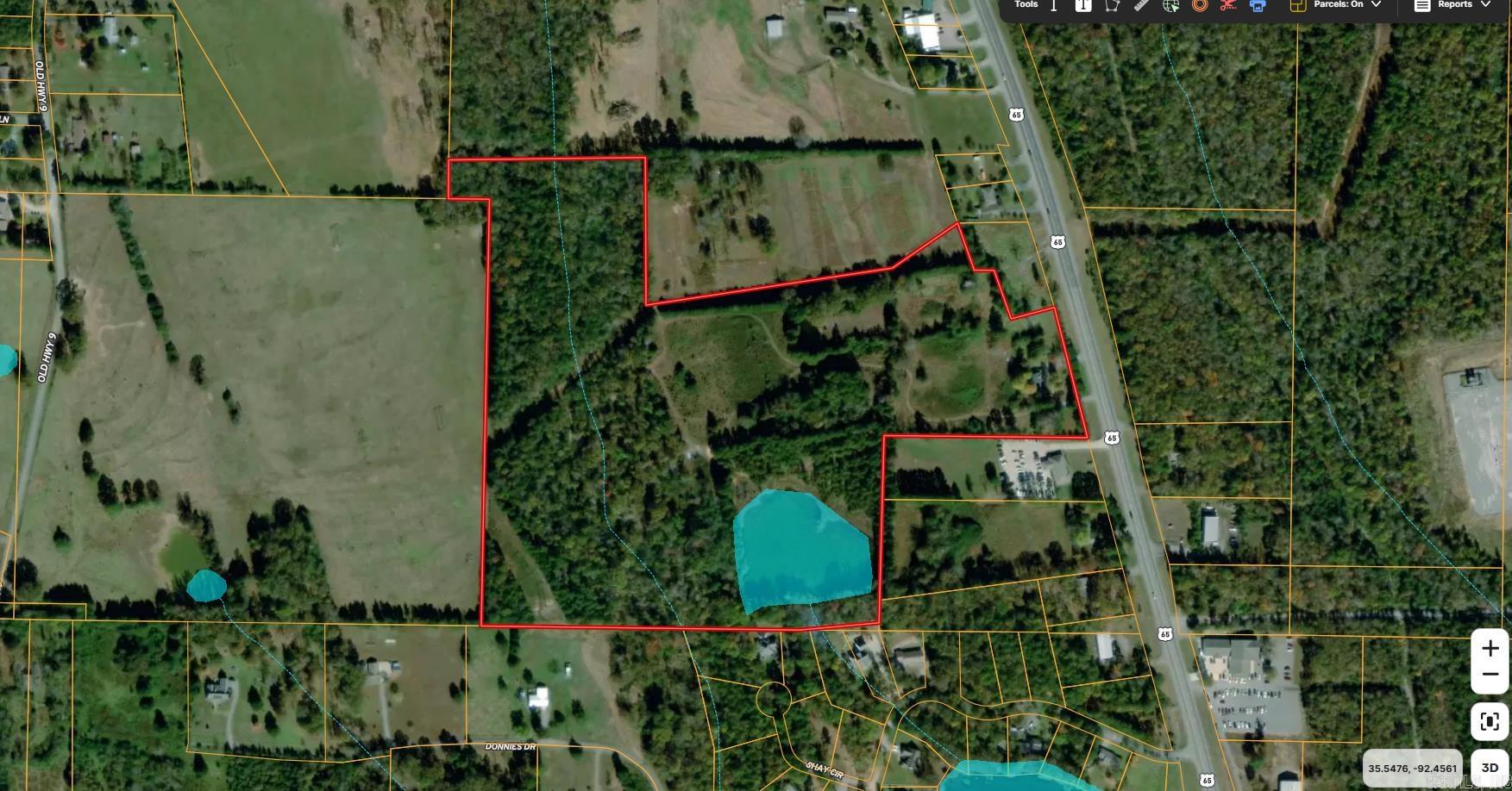 Brick home located inside the city limits of Clinton. Highway 65 frontage Property can be used for residential or commercial purposes. Up to 42 acres are available for larger development