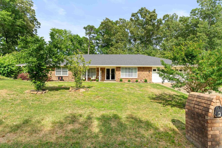 This one checks all the boxes! A spacious 5 bed, 3 bath home tucked in a quiet cul-de-sac in Maumelle. Conveniently located between Little Rock and North Little Rock, you’ll have easy access across Central Arkansas. You’re just minutes from Lake Willastein Park, Lake Valencia Park, and scenic trails—perfect for enjoying the outdoors while staying close to everything.  At the entry, double doors open to a flexible office or den, leading into a large living space with vaulted ceilings, gas log fireplace, and built-ins—ideal for relaxing or entertaining.  The kitchen features stone countertops, island, tile backsplash, stainless appliances, and a bright eat-in area with French doors to a covered patio. A formal dining room adds even more space to host.  The primary suite offers a bay window, double closets, and a remodeled en-suite with a glass shower. Three additional bedrooms share a bath, with a fifth bedroom providing extra flexibility.  Enjoy a screened-in porch, landscaped backyard, two sheds, side parking, and a whole-house generator.  9 Leeward Ct. - Welcome Home