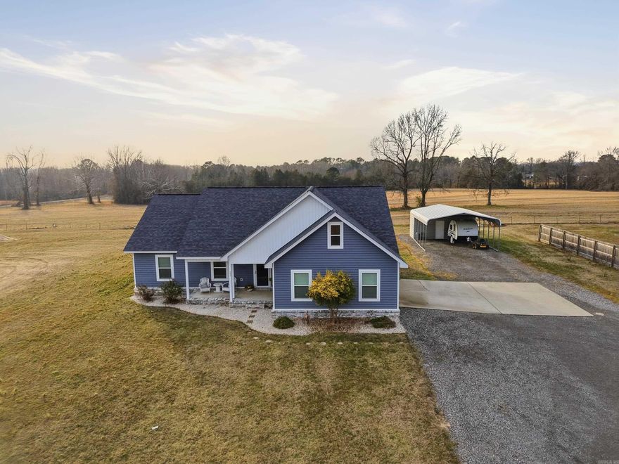 Beautiful well-maintained home in Greenbrier School District on 1.51 acres! Great split floor plan with a stunning kitchen.  Kitchen features custom backsplash, quartz countertops, and stainless steel appliances. Mudroom just off of the two car garage leads to the private primary suite. The primary bathroom has two sinks, a nice shower, and a walk-in closet. The outdoor features of this home are amazing!  The home features an inviting front porch, a screened-in back porch, a covered patio, and an above ground pool with deck.  Now is a great time to buy so you can enjoy these awesome outdoor features with spring and summer right around the corner. The property also features a carport, storage room off the carport, and electric hookup for an RV.  The views from the pool/covered patio are gorgeous. Great location, only 3 minutes to Wooster, 8 minutes to Greenbrier, and 15 minutes to Conway. Currently zoned for Wooster Elementary School, which is one if the top rated elementary schools in Arkansas. Home sits a good distance off the highway. Estimated annual taxes includes $600 Arkansas Homestead Credit. Schedule your private showing today!