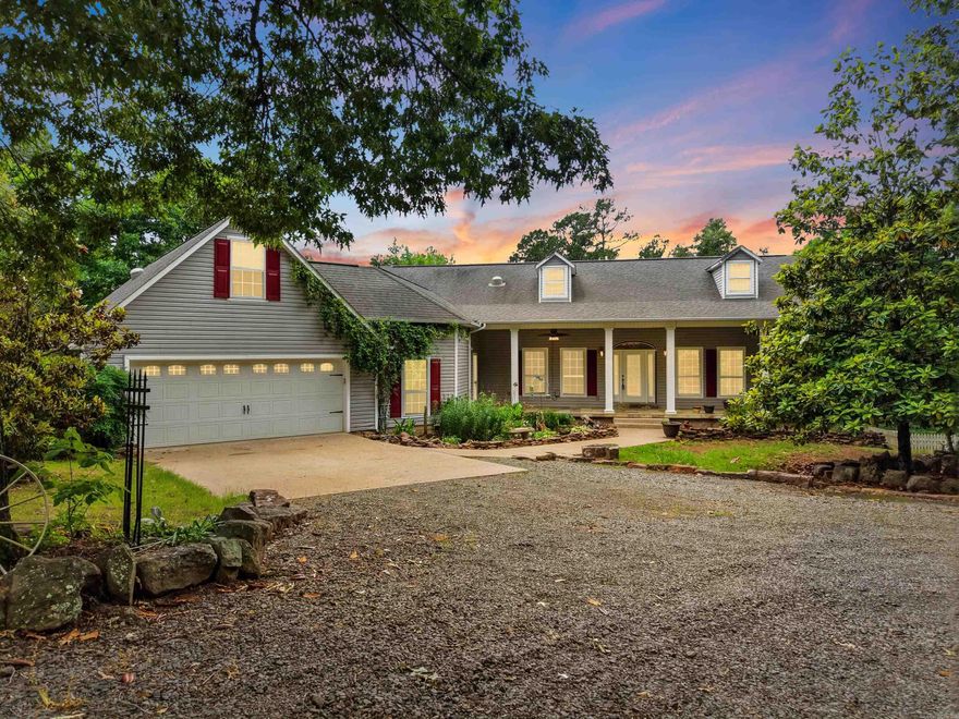 Tucked away in the Ozarks on 40 breathtaking acres, this one-of-a-kind property offers the peace, privacy, and freedom so many dream about. Just minutes from Greers Ferry Lake, Fairfield Bay Marina, ATV/UTV trails, and all the amenities of the Bay, you can enjoy adventure and relaxation in equal measure. Wander the private trails that wind throughout the acreage, pick fresh cherries, wild plums, strawberries, and muscadines, or spend evenings in the garden surrounded by nature’s beauty. The wraparound porch, screened sitting area, grilling space, and sparkling swimming pool create the perfect setting for gathering with family and friends or simply soaking in the quiet. Children will love the fenced play area while the pole barn and attached workshop offer endless possibilities. Inside, you’ll find soaring 10-foot ceilings, a spacious utility/laundry room that also serves as a safe room, generator hookup for peace of mind, and updated HVAC systems for comfort year-round. Best of all, this private retreat is remarkably free of mosquitoes, allowing you to fully enjoy the outdoors from sunrise to sunset. This isn’t just a home—it’s a lifestyle. Some photos have been virtually staged.