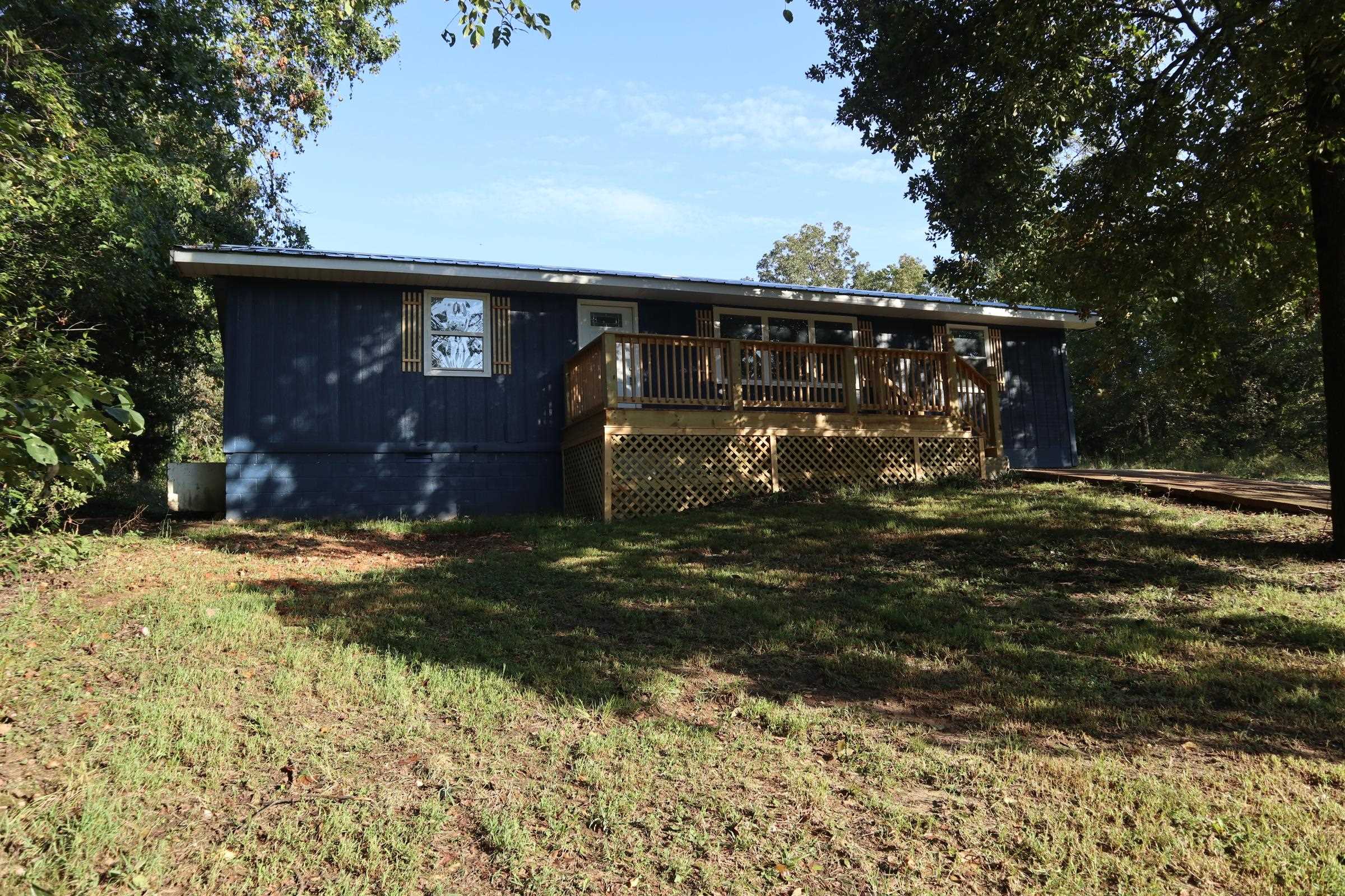 RANCH STYLE HOME FOR SALE HORSESHOE BEND ARKANSAS Property is located at 1512 W Cardinal Dr., Horseshoe Bend, AR.Ā This recently renovated ranch-style home in Horseshoe Bend, AR offers the perfect blend of comfort and convenience. With approximately 1,200 square feet of living space, this 3-bedroom, 2-bathroom home is perfect for families or individuals seeking a cozy retreat. Inside, enjoy fresh laminate flooring, new paint, doors, and cabinet tops throughout. Stay comfortable year-round with central heat and air conditioning. Outside, you'll find two generous city lots providing ample space for outdoor activities or potential expansion. The property offers convenient street access both in front and back, making it easy to come and go. Don't miss this opportunity to make this beautifully updated home your own! Property is located minutes away from Turkey Mtn. Golf Course and Crown Lake.
