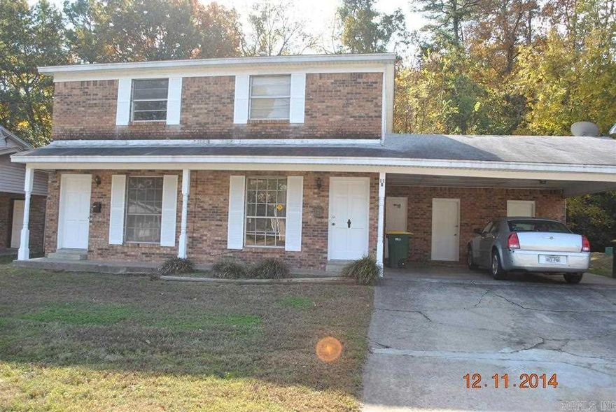 Duplex on quiet cul-de-sac; 2 beds/1 bath upstairs; living room with 1/2 bath down; furnished kitchen; washer and dryer connections; central heat/air; carport.