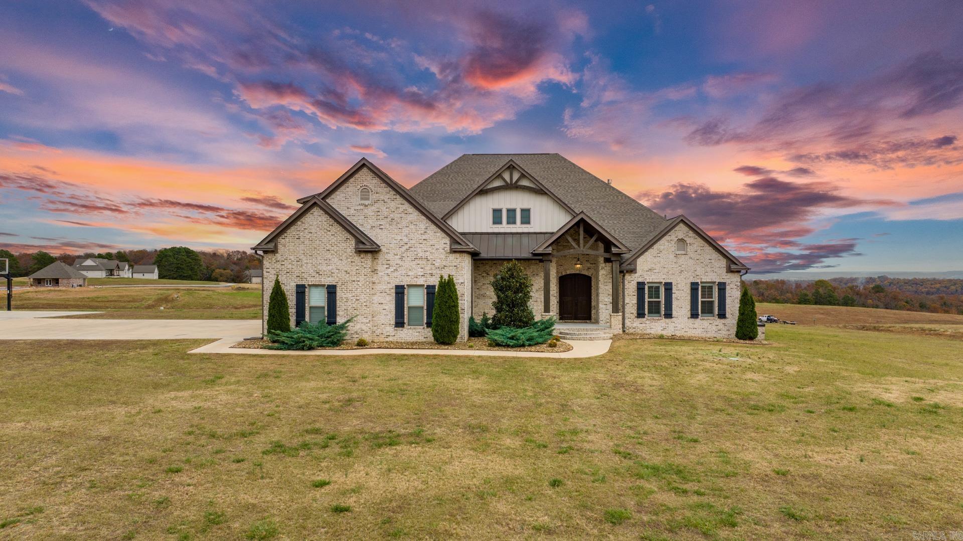 Executive home on over 3 acres in Greenbrier School District!!! Here the list of features: Solar shield under shingles, backyard was prepped for pool and has power to accommodate pool, whole home filtration system, attic is floored and doors added in multiple places, garage is taller, wider, and deeper than typical, also garage has 30 amp breaker for freezer, built in beverage fridge, sonic ice maker, 8 ft solid doors at every entry on 1st floor, laundry and bathrooms all have added built ins and laundry hampers, double ovens, thermador gas range, gas fireplace with remote control, bosch diswaher, vaulted tonque and groove ceilings + beams in living area, built in desk or homework area off breakfast area, built in make up vanity in master bath, tankless water heater, upstairs could be primary bedroom,guest bedroom, media or game room or more, laundry has sink, folding area, and hidden laundry baskets, all bathrooms have hidden laundry basket cabinets, 5 X 11 kitchen island, wainscoating in formal dining room, plantation shutters on front windows, tile in all wet areas, large screened in back porch, large back patio area, 50 X 50 basketball court, could be an shop area.