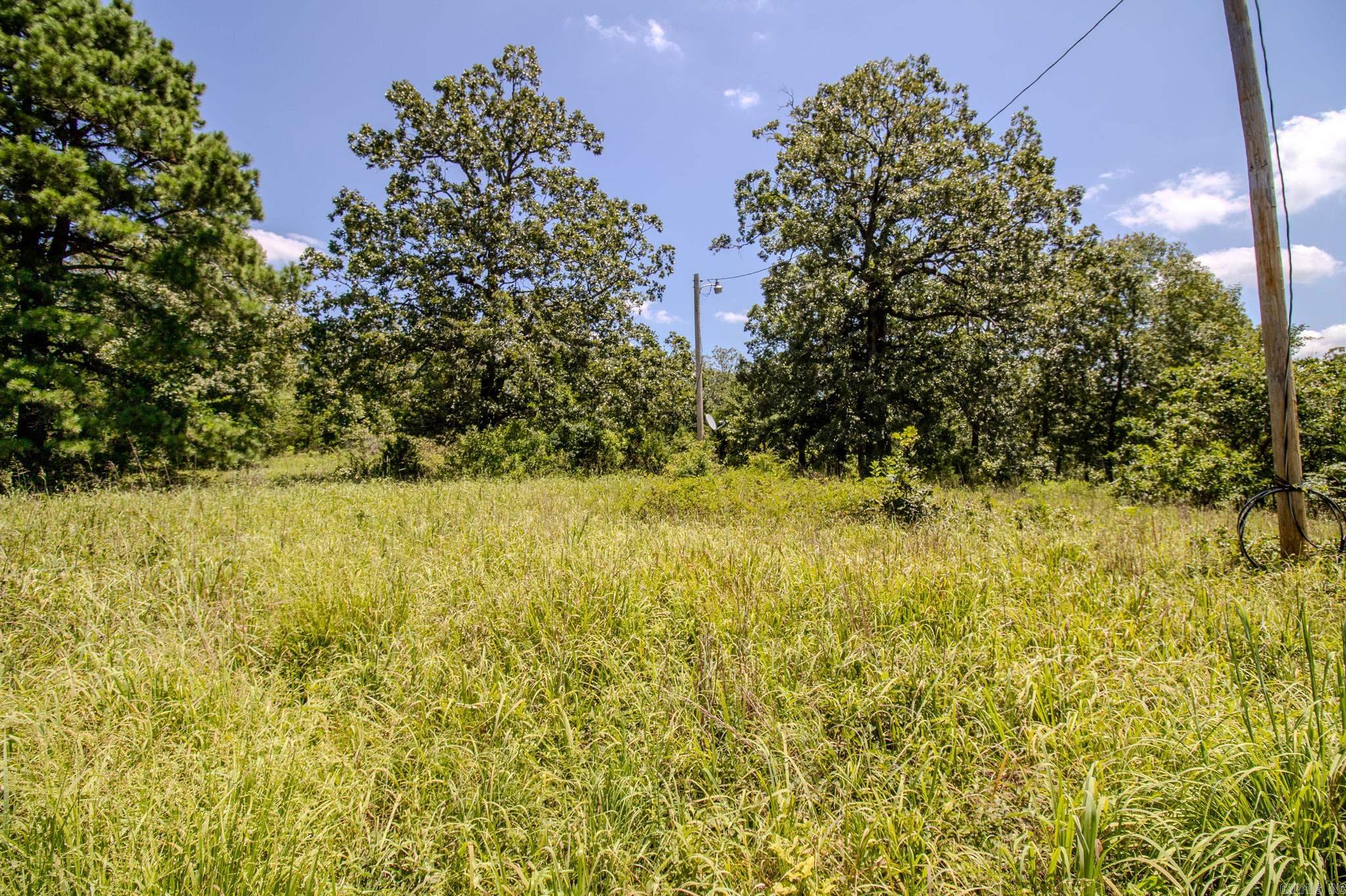 Peaceful 1.87 Acres in Riverwood Estates ā Surveyed & Ready to Build Tucked away in the quiet heart of Riverwood Estates, this 1.87-acre parcel offers the perfect mix of cleared space and natural wooded privacy. Located near the end of a low-traffic gravel road, the setting is calm and secludedātraveled only by nearby residents. Recently surveyed with clearly marked boundaries, the property is easy to navigate and ready for your visionāwhether you're planning to build your dream home, weekend retreat, or hold as an investment. While mountain views greet you on the way in, the lot itself is surrounded by peaceful woods and the soft sounds of nature. If you're looking for a quiet escape with just the right balance of open space and forested charm, this is the one.