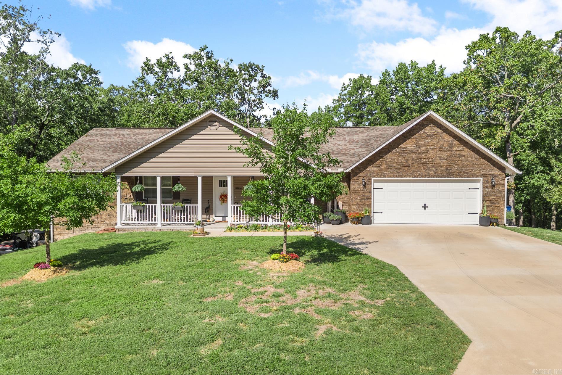 Built in 2021, this 3,200 sq ft home on 3.95 acres blends comfort and style. Inside you'll find cathedral ceilings, granite counters, and a warm open layout perfect for gathering. The finished walk-out basement adds a kitchenette, bedroom, bathroom, flex room, plus a 3rd garage. With a covered deck for entertaining, raised flower beds, and a whole-house Generac, this property is ready to welcome you home.