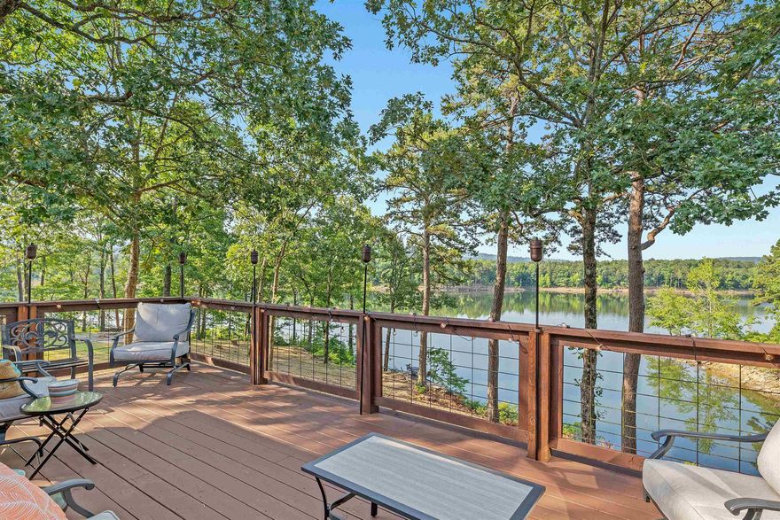 Discover your dream lakefront retreat at 198 Wildflower Ln, located on the serene shores of Greers Ferry Lake! This stunning 4-bedroom, 4.5-bath home offers breathtaking lake views and a perfect blend of luxury and relaxation. With spacious living areas, a gourmet kitchen, and large windows that flood the space with natural light, you’ll enjoy seamless indoor-outdoor living. Designed with entertaining in mind, the home features a fantastic bunk room that sleeps up to 10, making it ideal for large gatherings or a potential vacation rental. The exterior boasts a low-maintenance, well-manicured yard leading straight to the water for all your favorite lake activities. Whether you’re looking for a weekend getaway or your forever home, this property is sure to impress! View the online documents for additional information ***See Agent Remarks***