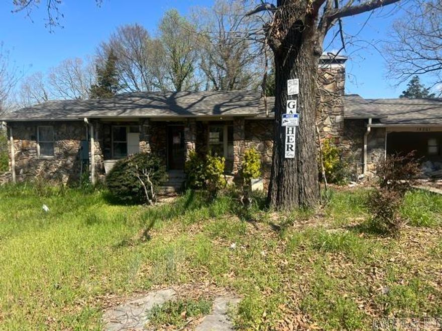 Calling all investors, flippers, and visionaries—this is your next project!  This 3-bedroom, 1-bath home sits on a spacious lot and already features a private in-ground pool, offering incredible potential for the right buyer. With its solid footprint and charming stone exterior, this property is ready to be brought back to life.  The home is not fully finished and will require repairs and updates, making it ideal for a cash buyer looking to renovate and add value. Whether you’re searching for your next flip, rental investment, or a personal project, this property has the bones to become something truly special.  Enjoy a quiet setting with mature trees and plenty of space to create your own outdoor retreat around the pool.  Sold AS-IS. Cash only.