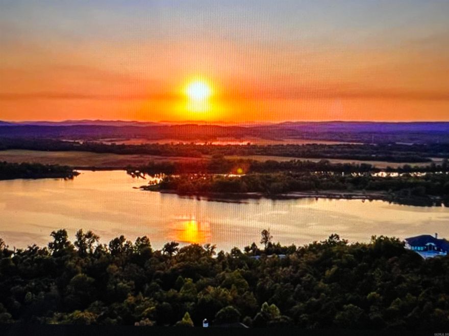 Come and enjoy the incredible views of Mountain Crest Estates! There are views of the Ar. River, Pinnacle Mt., Chenal and unbelievable sunsets. All underground utilities; water, electricity, gas, sewer, ATT high speed fiber. Dwelling minimum 2500 sq. ft.  This property has a back easement for easy access.  Gated for privacy and security. The gate is open Saturday and Sunday 1-4. You're always welcome!!