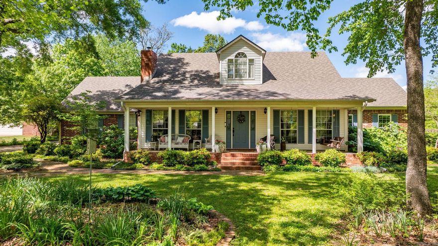 Darling home on Dennis. This two story home combines modern amenities with classic touches, creating the perfect blend for comfortable living. The heart of the home is the beautifully designed kitchen, with quartz countertops and a Jenn Air cooktop/oven combo. White custom cabinets provide ample storage including practical pullouts for easy access. Enhanced by recessed lighting, this kitchen is ideal for family meals and entertaining. The main level houses 2 bedrooms, offering convenience and privacy, while the upper level accommodates two additional bedrooms. Throughout the first floor, hand scraped wood floors add a touch of rustic elegance, with carpeting upstairs for added warmth and comfort. The homes wood burning Buck fireplace provides a cozy atmosphere, making it an inviting spot during cooler months. Outdoor living is just as impressive, with a whole yard irrigation system ensuring, well-maintained landscaping. Cypress barn, electricity and covered storage on 3 sides. Inground storm shelter, wooden privacy fence,  brick walkway, and so much more.  Don't miss the opportunity to make this your forever home.