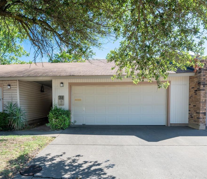 Charming townhome conveniently located close to great restaurants and shopping! Wonderful floor plan with a private entrance and easy flowing dining and living spaces. Two spacious living areas...one with WBFP, the other with a wet bar plus access to private courtyard through new patio doors. Kitchen with pantry for storage and half bath. Upstairs find two large bedrooms each with full bath. Laundry closet space upstairs. Inviting courtyard connects to 2 car garage. New HVAC upstairs! Pool and clubhouse to enjoy - this is a great condo to call home!