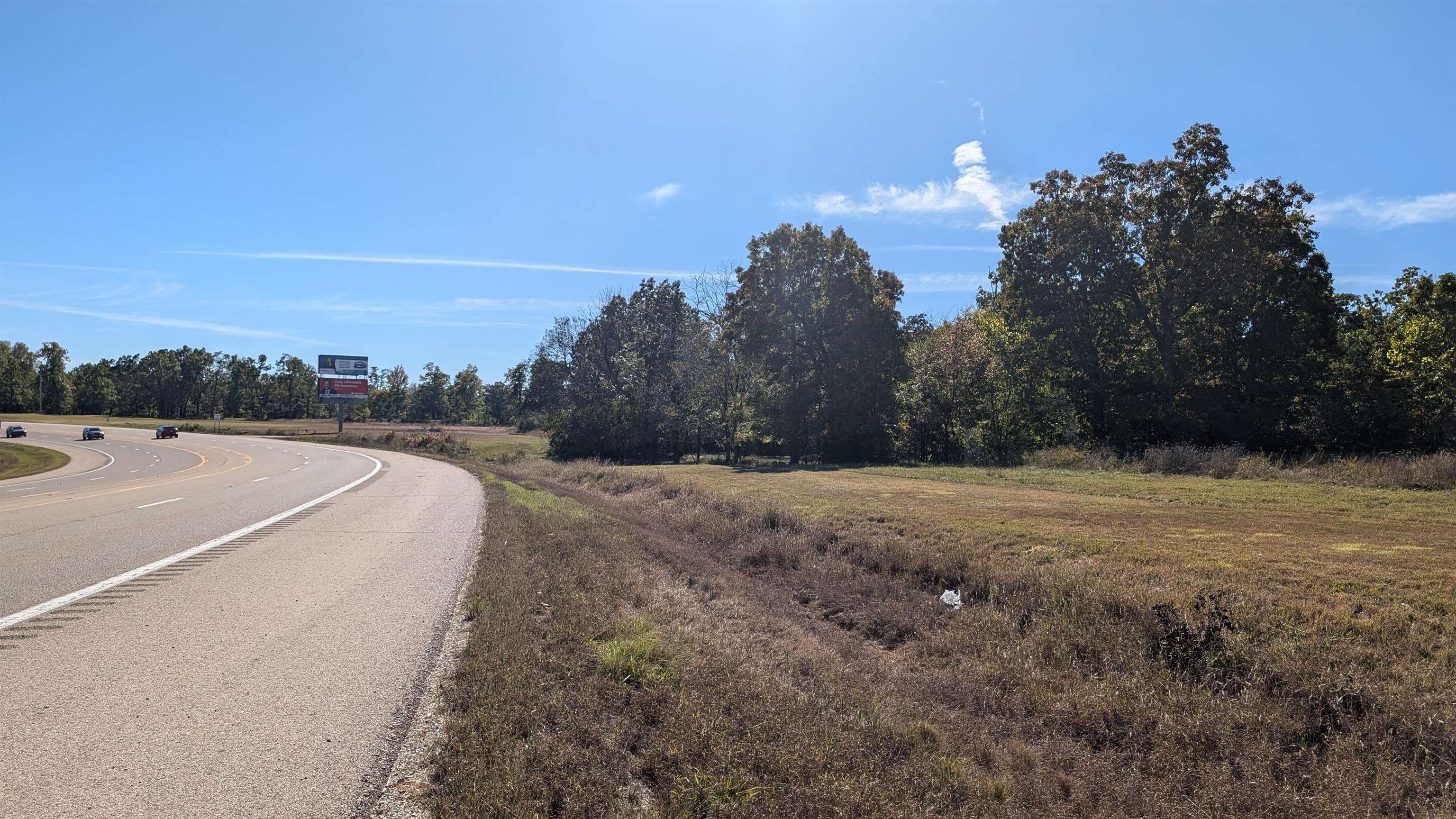Almost 300ft of highway frontage! These 4 parcels together amount to almost an acre and a half of land. Build your house in the back and have your business on the highway! Three lots on bittersweet are on a gravel road, but no far out to highway from that side either. City water and sewer as well as electric at the road. Taxes barely over $100 per year for all parcels. High Traffic area on 5 lane highway between Missouri border and Little Rock