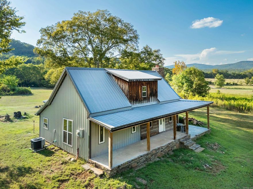 Own a piece of history with this charming cabin, originally constructed in 1860 and thoughtfully updated for modern living. Rich with character, the home showcases the craftsmanship of its era while offering the comforts you expect today. Set on 3.5 acres just outside city limits, it provides the perfect balance of privacy, nature, and convenience. From its storied past to its inviting spaces, this rare property is more than a home—it’s a timeless retreat waiting for its next chapter.
