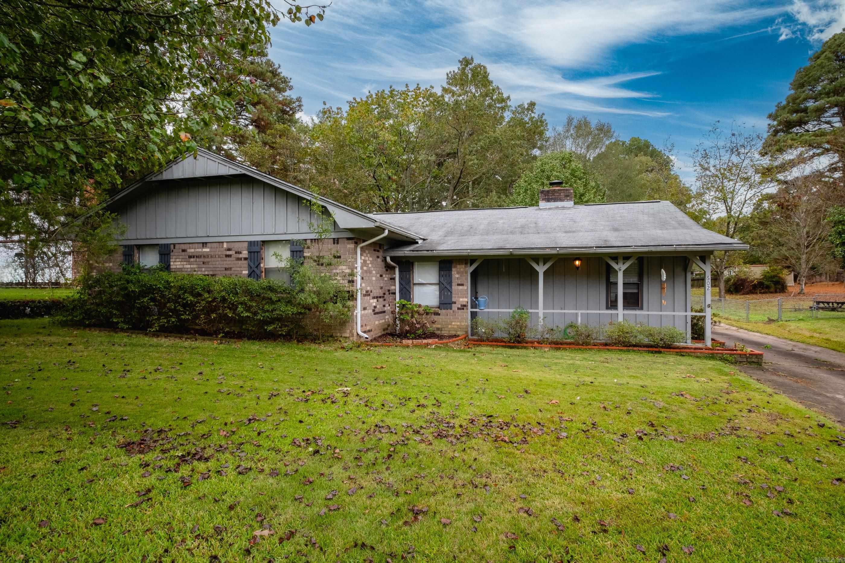 One level home in great area of White Hall! So much opportunity, large primary suite, large living room with wood floors and wood burning fireplace, rear loading two car garage, huge fully fenced backyard.
