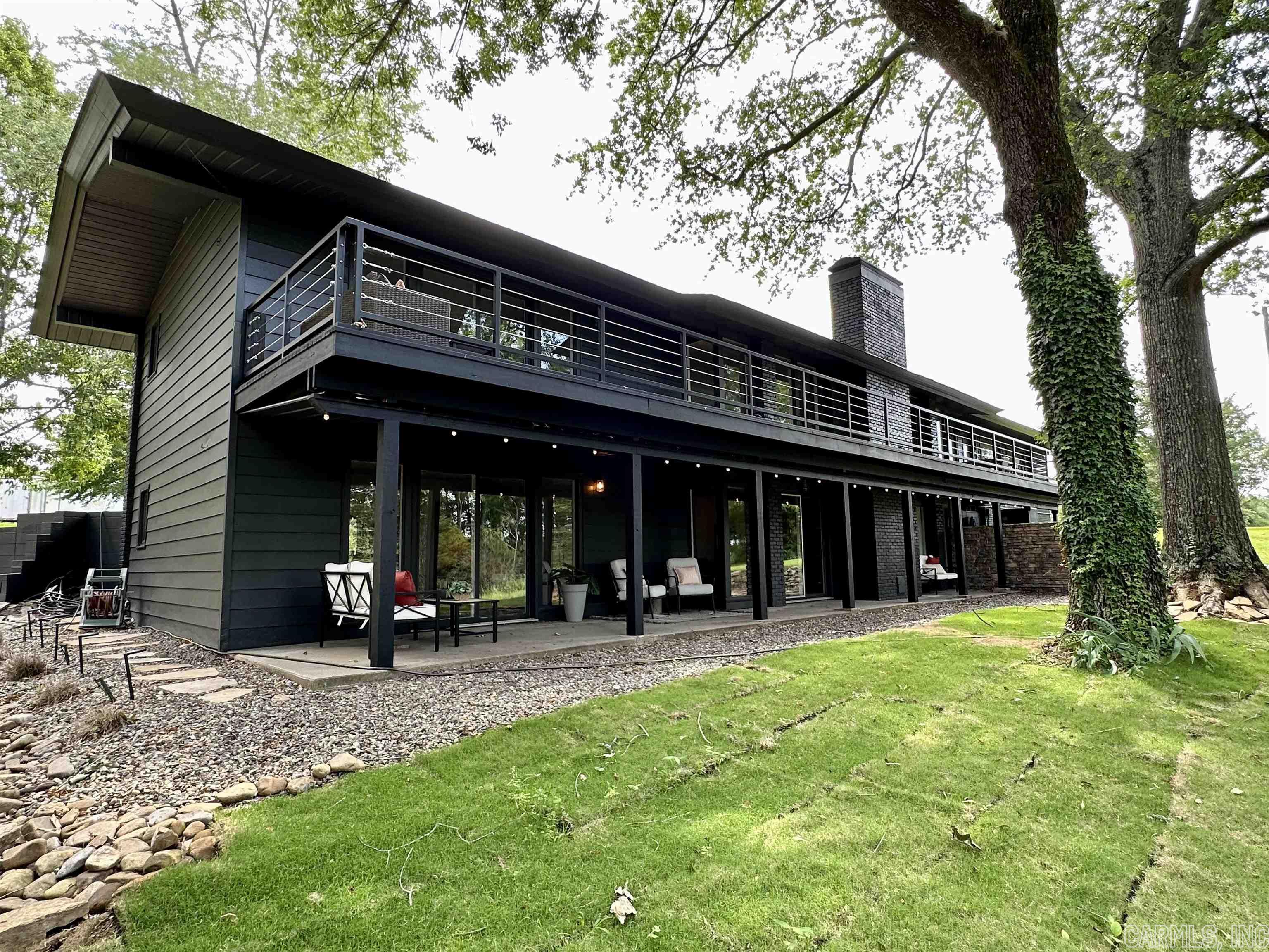 Breathtaking Greers Ferry Lakefront home remodeled from top to bottom. New architectural shingles, HVAC, water heater, flooring & paint inside & out. Kitchen features new cabinets, counters, Kitchenaid appliances, wine refrig, icemaker & Island w/seating. 2 master bedrooms, 2 living rooms w/fireplaces, 4th builtin sleeping area. The home can be purchased completely furnished $1,050,000.00. The location of this captivating home can not be beat, walk to Sandy Beach for all the summer activities, minutes from downtown Heber Springs shopping & dining, quiet, tucked away, upscale established neighborhood. Excellent vacation rental potential too! See Documents & Agent Remarks for more information.