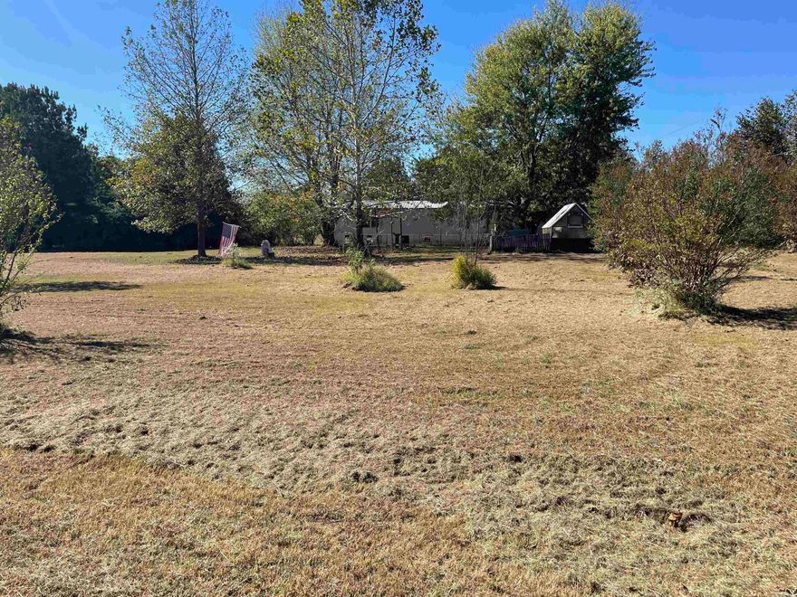 This property has a Bradford address but is just before Pleasant Plains. Approximately 5 acres with utilities on property.   There is a mobile home on property that needs some work and seller is not giving any value. This property has a well.  North White County Water is on Scoggins rd.  Minerals do not convey  *SEE AGENT REMARKS*