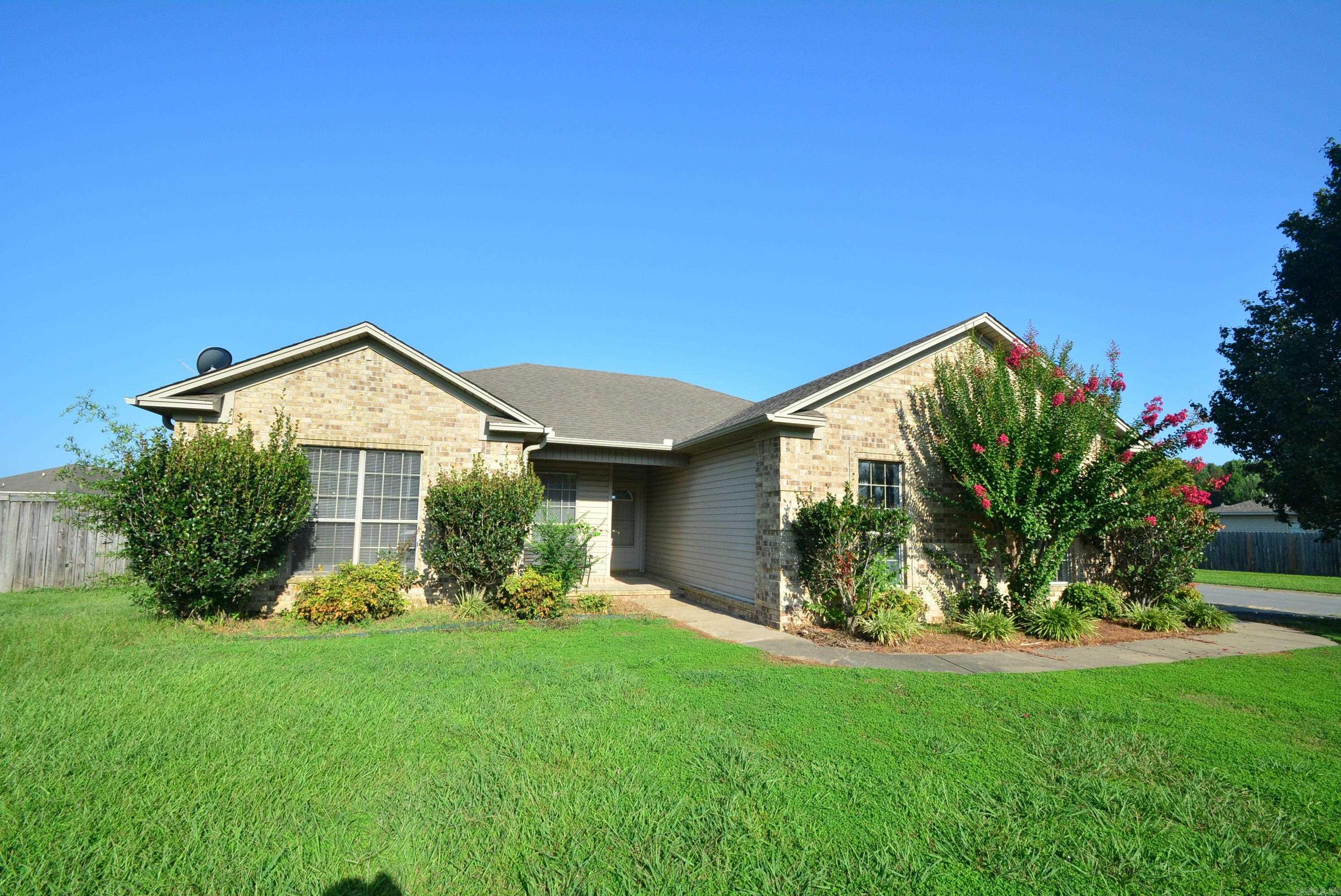Nice home on a big corner lot. Brand new luxury vinyl plank flooring in the living room. Fresh paint on all walls. Gas log fireplace. A new roof has just been installed. New range and microhood in the kitchen. HVAC was installed in June of 2022. Water Heater was installed in 2017. Split bedroom plan. Twin sink vanity and walk in closet in the master bath. Big side loading garage. Shop building in the backyard. Sun room added on. Give it a look! Great starter home or investment property!! Square footage is from county tax records.