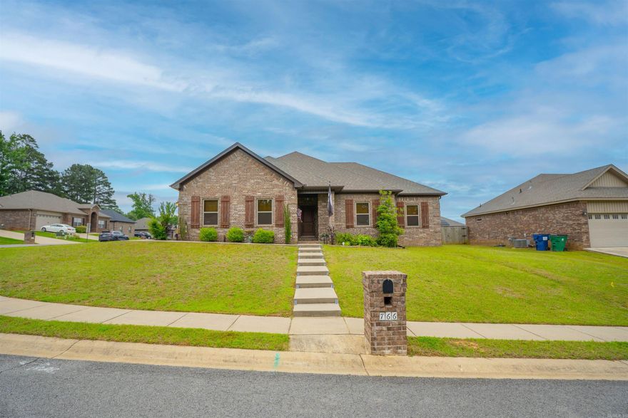Welcome to this beautifully maintained corner-lot gem, offering the perfect blend of style and functionality! Step inside to discover low-maintenance tile flooring throughout that captures the warm look of hardwood—ideal for both elegance and durability. The open-concept floor plan flows effortlessly, creating a bright and inviting atmosphere perfect for entertaining or everyday living.  This home boasts four spacious bedrooms, providing ample room for family, guests, or a home office. The expansive backyard is a true highlight, featuring generous space for outdoor enjoyment along with the added peace of mind of a built-in storm shelter.  Whether you're looking for comfort, convenience, or curb appeal, this home checks every box.