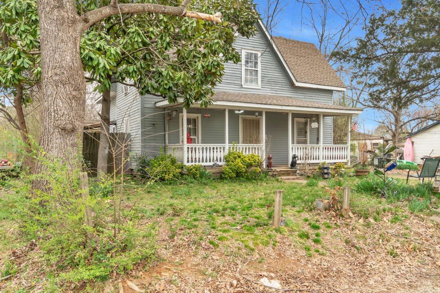 Move into history with this charming home built in 1896. Build in equity while you're making this timeless house shine. Featuring classic architecture, hardwood floors, and an updated kitchen and bath, it blends old-world charm with modern touches. Nearly all windows have been replaced. While central heating and cooling aren’t installed, the wall-mounted heater in the kitchen has worked well for the current owners. Located near schools and amenities, this home is a prime opportunity for restoration or investment. Don’t miss the chance to make it your own!