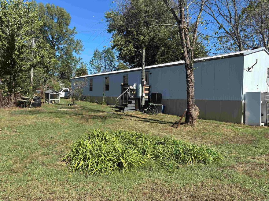 Bring your animals and enjoy this 5 acres.  On a dead end road.  3 bed 1 bath mobile.  There were 2 baths and the one in the master could be turned back into one.  Sellers are not sure if H/A works.  They have never turned it on since owning.  Wood stove in living area does not convey.  Property is on a well, it is inside a greenhouse and they have had no problems.  Nice piece of property with mobile home.  Seller will have all the animal pens removed and cleaned up before closing.  This property has a Bradford address but is closer to Pleasant Plains. They have made an area under some trees they call the Playhouse.  Minerals are neg.