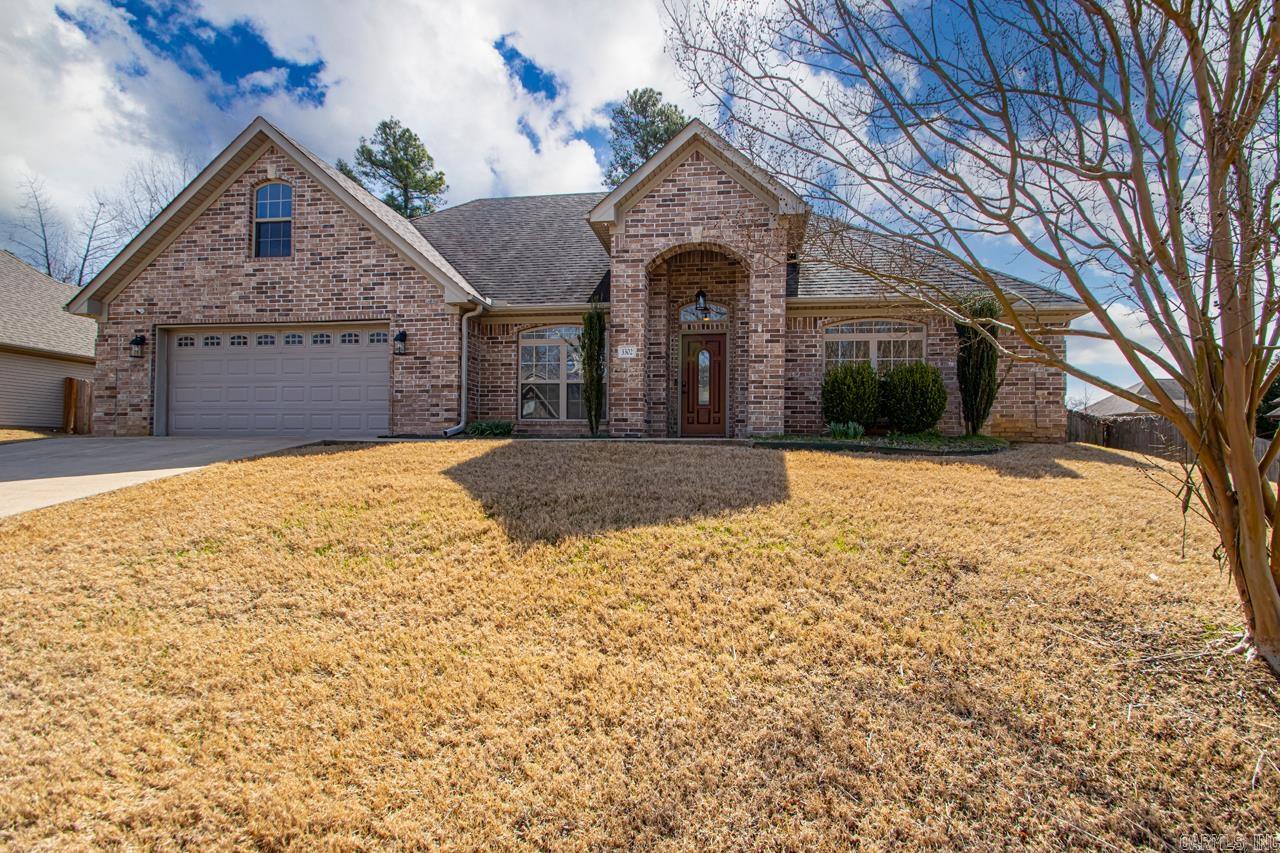 This stunning Andres Gardens home is entirely move-in ready for you! The neighborhood offers exceptional convenience with easy service road access to both Little Rock and the Benton/Bryant area. The home features three bedrooms and two baths on the main floor, with the primary bedroom and bath separate. You'll love the huge walk-in closet with separate tub and shower in the primary bath along with dual vanities! Need a 4th bedroom? No problem! There is a spacious bonus room/4th bedroom upstairs. Recent updates include fresh paint, new carpet, and new exterior light fixtures. Situated on one of the larger corner lots in the gardens, the property boasts a perfect covered patio and fully fenced backyard. Get your tour scheduled today!!