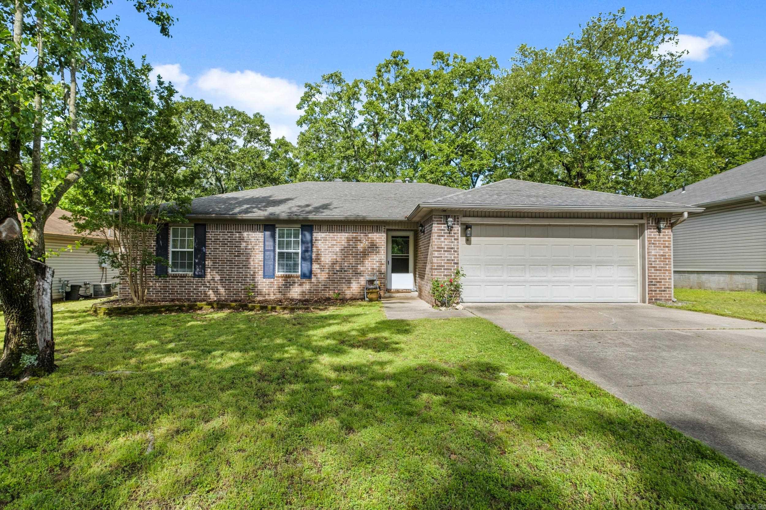 Cute, cute, cute!! Welcome to this adorable 3 bed, 2 bath brick home in the heart of Sherwood! This home is move-in ready and offers a bright and functional kitchen with beautiful mosaic tile backsplash, crisp white appliances, and plenty of cabinet space. The cozy living space with vaulted ceiling flows seamlessly for everyday comfort or easy entertaining and includes a gas fireplace. Step outside to enjoy the covered patio complete with ceiling fans—perfect for morning coffee or evening hangouts. Separate laundry room, Oversized primary and walk in Pantry. The backyard is fully fenced and includes a shed for storage. Whether you’re a first-time buyer, downsizing, or looking to invest, this home is a must-see!