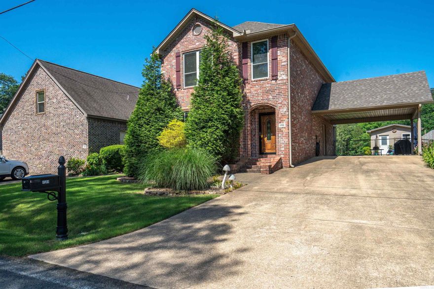 Welcome to a Stunning Home on the beautiful Ouachita River & Lake Hamilton. This home is a completely updated, meticulously maintained 3 bedroom, 2.5 bath waterfront home with modern amenities and stylish finishes including crown molding throughout.  On the lower level your eyes are drawn to the breathtaking views from the open glass window living room/dining room. The gourmet kitchen is equipped with gas double stove/convection oven, LG refrigerator, dishwasher, large sink, pantry, and coffee bar.  Once upstairs, the oversized primary bedroom, complete with tray ceilings, boasts a full open view of the lake and lovely manicured lawn. The en suite includes a separate tub with a walk-in shower and a walk-in closet.  It doesn't stop there! This open concept waterfront home also includes a sundeck, stationary covered dock with a power lift. (18ft 2021 Ranger Pontoon Boat is negotiable) The unfinished Guest House currently adds a completed 4th bedroom with a waterfront porch, a storage room, and Nice workshop.  *New Roof 2023/New Windows 2022* Make your lakefront living dreams come true!! Also great VRBO for investors! Call today for your private showing!