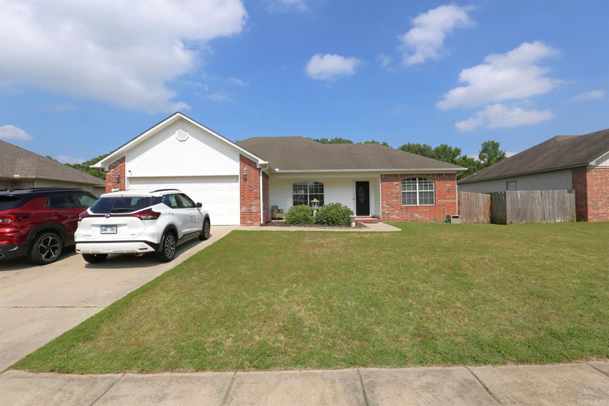 You are going to Love this Beautiful Home on a large fully fenced lot and in a great family friendly neighborhood with two area ponds full of fish, walking trails, picnic area and a playground! This home features family room with double tray ceiling and corner fireplace,  stainless appliances and lots of cabinet space in the kitchen. The master bath has double vanity, separate jetted tub, walk in shower, and walk in closet. Come relax on the back deck with the canopy and lights. Don't miss out.... Call and schedule your showing of this home today!