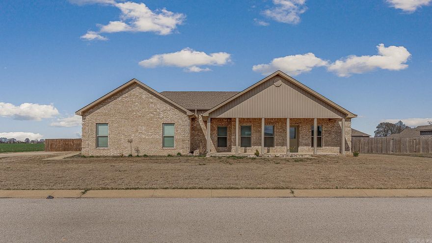 Charming 3 bedroom, 2 bath home with 1,961 sq ft situated on a large lot. This home features a spacious master suite with a walk-in shower, a screened-in back porch perfect for enjoying evening outdoors, and a backyard enclosed with a stained privacy fence. The 2-car garage provides plenty of storage and parking.
