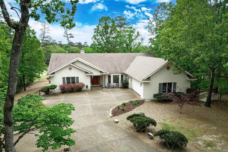 RARE 3/2.5 one-level home in Diamante subdivision.  Welcome to 9 Redondo Lane.  Located on the 11th fairway of Diamante golf course.  A wall of windows flank the open living area making it ideal for entertaining from the open concept living space to the back deck that stretches the length of the house with amazing views of the golf course.  UPDATED in 2025. Split floor plan, 2 walk-in closets in primary, stainless steel appliances, an oversize garage & 2 water heaters.  HVAC 2020 with overhaul 2025.  Property is located at end of cul-de-sac with wooded lot on one side for ample privacy.  Beautiful private golf course & subdivision in Hot Springs Village AR.  Diamante subdivision & country club is home to Golf Digest #4 ranked AR golf course.  Club amenities include world class tennis & pickleball, a private swimming pool & a wide array of dining & social events. Property owners receive 3 free rounds of golf each month for family & friends.    HSV is America’s largest gated community encompassing 26,000 acres, over 30 miles of walking trails, 9 golf courses & 11 lakes for fishing & boating.  HSV is 15 miles from historic Hot Springs National Park & Oaklawn Racing Casino Resort.