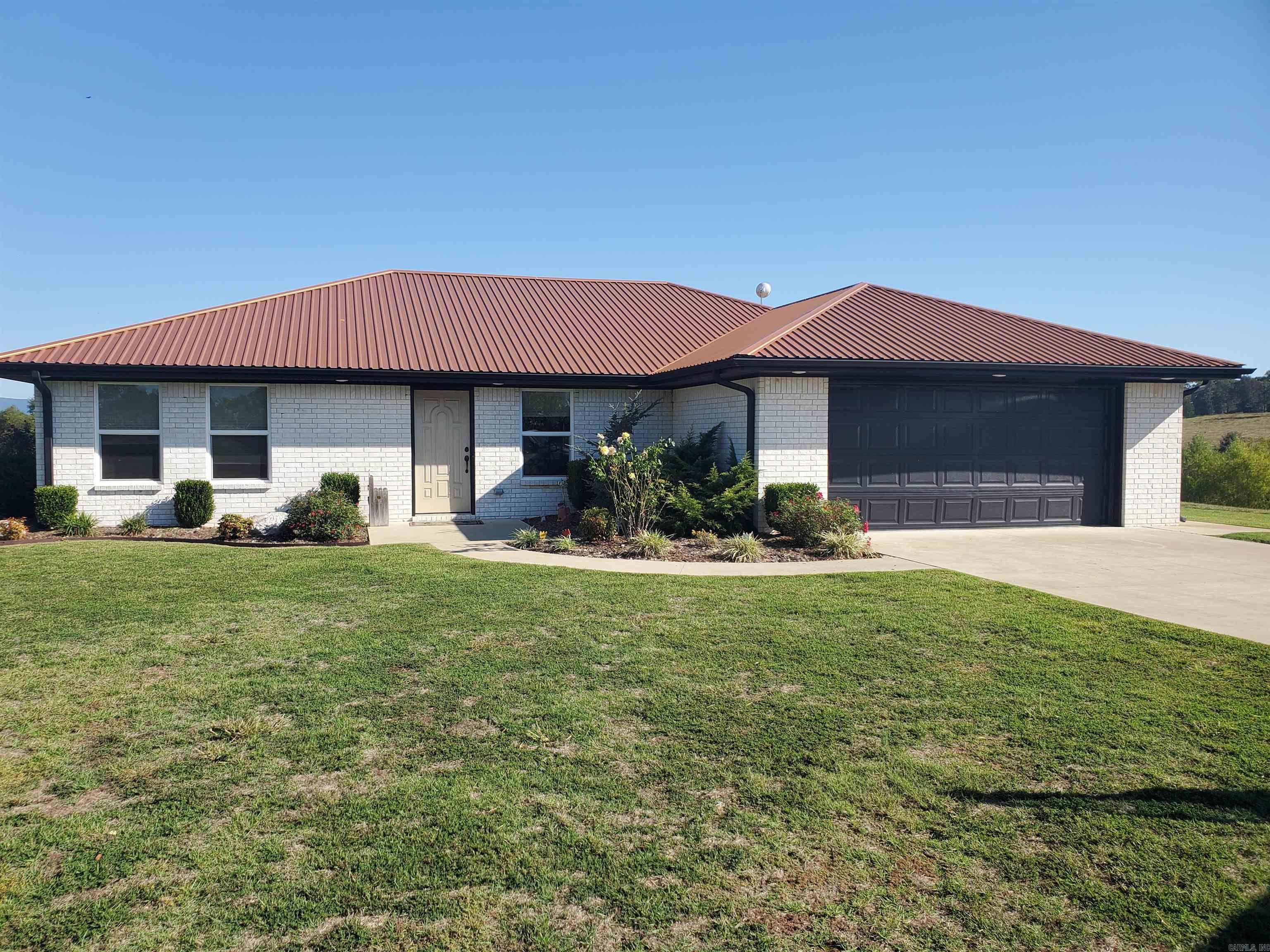 Stunning 3BR/2BA Brick Home on 5+ Acres with Pond Access & Mountain Views! Welcome to your own slice of paradise! Built in 2019, this beautiful 3-bedroom, 2-bath brick home sits on 5+ serene acres at the end of a private driveāperfect for those seeking peace, privacy, and incredible natural beauty. Property Highlights: Partial ownership of a scenic pond with your own floating dock and deckāperfect for fishing, kayaking, or relaxing by the water. Unbelievable mountain views from the back deck ā your morning coffee spot just got a major upgrade. Open-concept floor plan in the living, kitchen, and dining areasāideal for entertaining. Split-bedroom layout offers added privacy for the primary suite. Durable metal roof and modern HVAC system for year-round comfort. Attached 2-car garage with plenty of storage. Pond is stocked with large bassāan anglerās dream! This home truly has it allāpeaceful setting, quality construction, amazing views, and outdoor recreation right in your backyard. Thereās so much more to love here, but you need to see it for yourself
