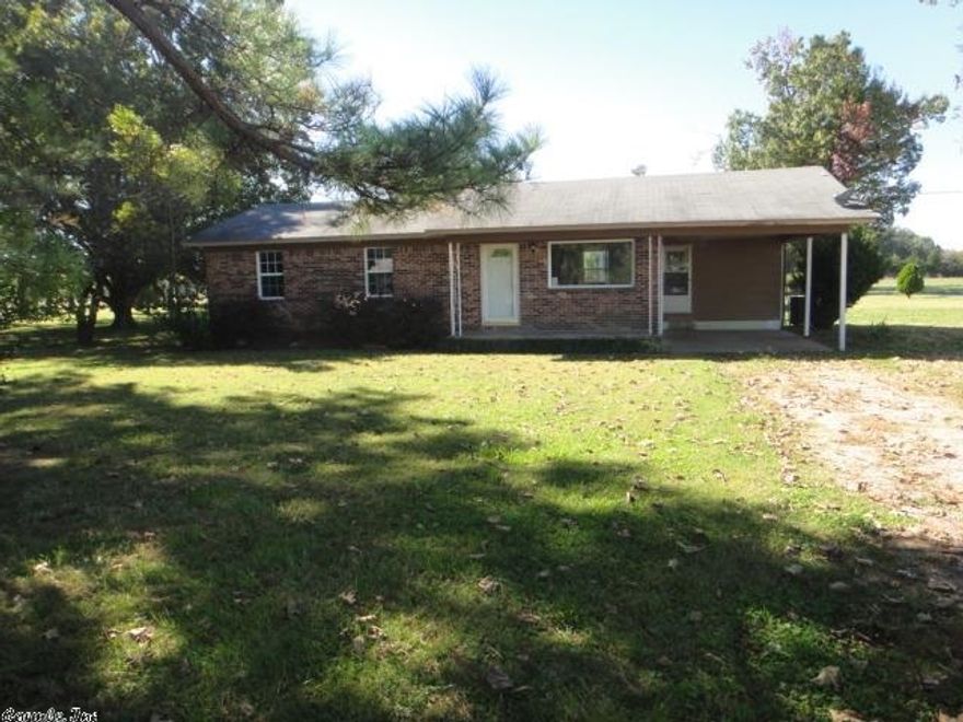 Cozy country home on acre of land. Kitchen/dining combo, laundry room, 3BR/1BA brick with spacious level yard. 18x20 metal storage bldg w/electricity. Property is sold "As-is" and "Where is" with no warranties expressed or implied. This property is now under auction terms. This property is subject to a 5% buyer's premium pursuant to the Auction Terms & Conditions (minimums may apply). This is a reserve auction and all offers are subject to seller approval. Please see Agent Remarks for details.