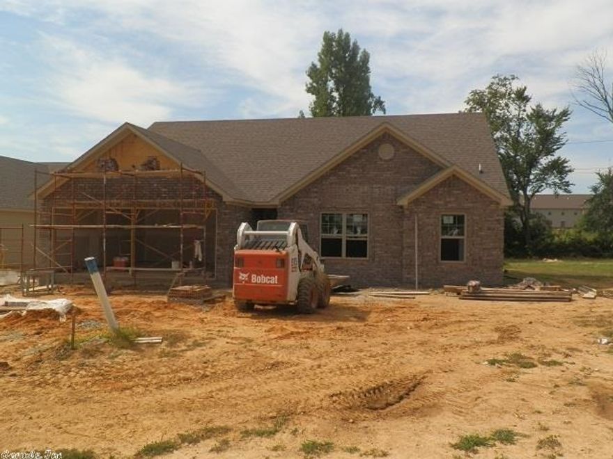 This 3 bedroom, 2 bath new construction, located in the Brownstone subdivision, is perfect for the first time buyer. Priced at just $149,500, its many features include cathedral ceilings, low maintenance acid-stained floors, a tray ceiling in the master bedroom, and a wood deck in the back yard. The buyer who acts quickly will have time to make carpet, cabinet, and counter top color selections.