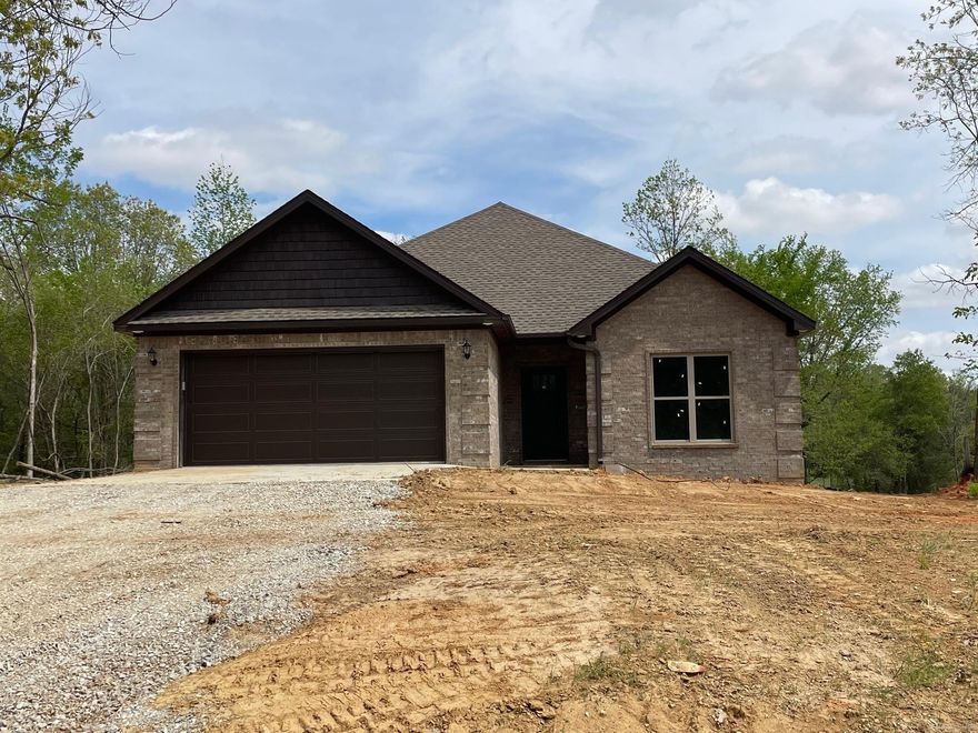 This home is almost complete.  3/2 Brick home in the country between Brookland and Paragould.  All Brick with an acre yard.  It includes a gas fireplace, open floor plan, granite tops, custom built cabinets, tiled walk-in shower, soaker tub, large laundry room with storage, a covered back porch, tall ceilings & stained floors.  GCT School district.
