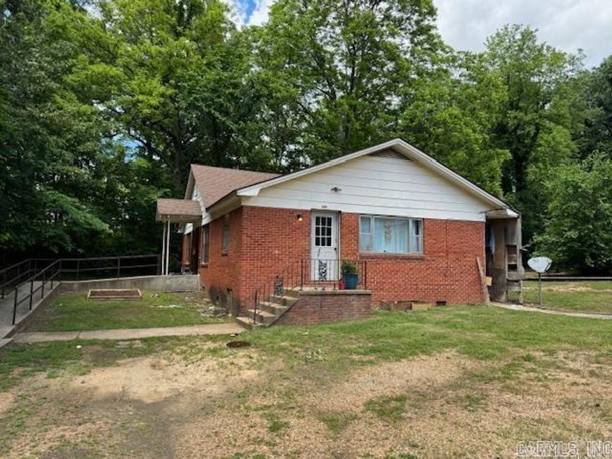 GREAT RENTAL HOUSE!!  1376 square foot home has HUGE living room, kitchen, 2 bedrooms and 1 bathroom. Fenced in area for kids or pets. Surveyed .393 acres. Bringing in $600 a month. Central heat and air. Home needs work, will not qualify for RD, FHA or VA loans.