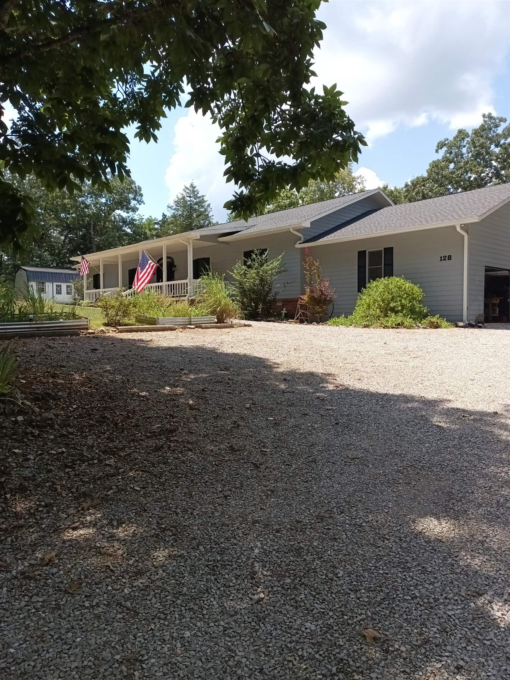 RIVERFRONT HOME located on South Fork River! Many updates throughout this spacious home. Including new roof, windows, HVAC, carpet in bedrooms, paint inside and out, new fence for pets and much more! New kitchen with island in walk -out basement living quarters with separate laundry from main floor. Would be perfect as an in-law living space at 1686 sq ft. Just finished added sunroom on main floor with cypress interior. Large meandering deck to the river. Outstanding views! Sizeable en-suite on main floor with large jetted tub, large walk-in shower and walk-in closet. Handicapped accessible. Attached two car garage with substantial room for tools and storage PLUS good sized storage shed and covered space. North Golf Course close by! Extra 2 river lots possibly negotiable. Seller is motivated and will entertain all offers. PHOTOS COMING SOON!!