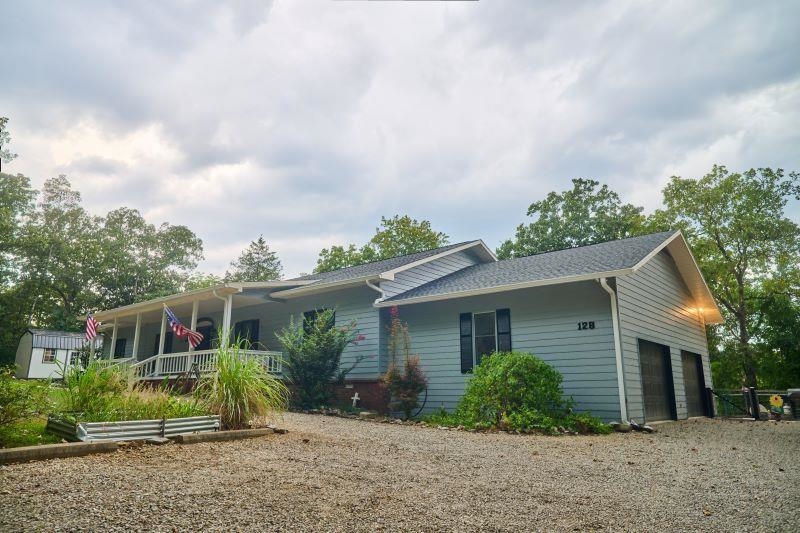 RIVERFRONT HOME located on South Fork River! Many updates throughout this spacious home. Including new roof, windows, HVAC, carpet in bedrooms, paint inside and out, new fence for pets and much more! New kitchen with island in walk -out basement living quarters with separate laundry from main floor. Would be perfect as an in-law living space at 1686 sq ft. Just finished added sunroom on main floor with cypress interior. Large meandering deck to the river. Outstanding views! Sizeable en-suite on main floor with large jetted tub, large walk-in shower and walk-in closet. Handicapped accessible. Attached two car garage with substantial room for tools and storage. Small covered outdoor storage. Large outdoor storage NOT included in purchase price. North Golf Course close by! Extra 2 river lots possibly negotiable. Seller is motivated and will entertain all offers!