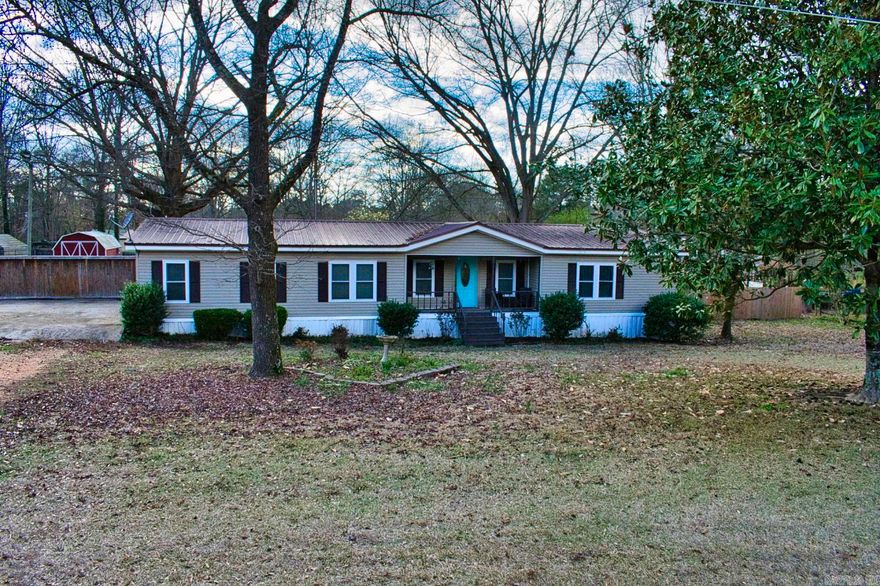 Come home to this lovely 3BR/2BA doublewide on permanent foundation that is all nestled on a level 3/4 acre lot! Inside you will find modern updates throughout and zero carpet anywhere. Enjoy your covered front porch in the mornings and your back covered deck at night! The two sheds in the backyard convey with any acceptable offer. Come see this one before it's gone!