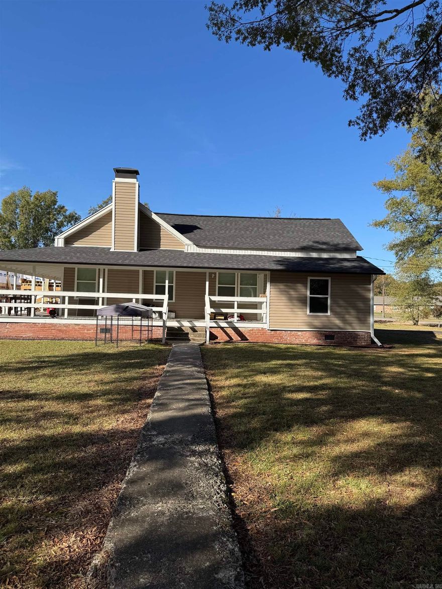 Step inside and be amazed at the transformation of this beautiful home.  It has been completely remodeled with fresh paint, new flooring, windows and doors.  It has a separate dinning room, large laundry room.  It also has a large porch on the front and one side to enjoy the morning and afternoons.  This is a short sale so bring your offer.  The list price has not been approved.