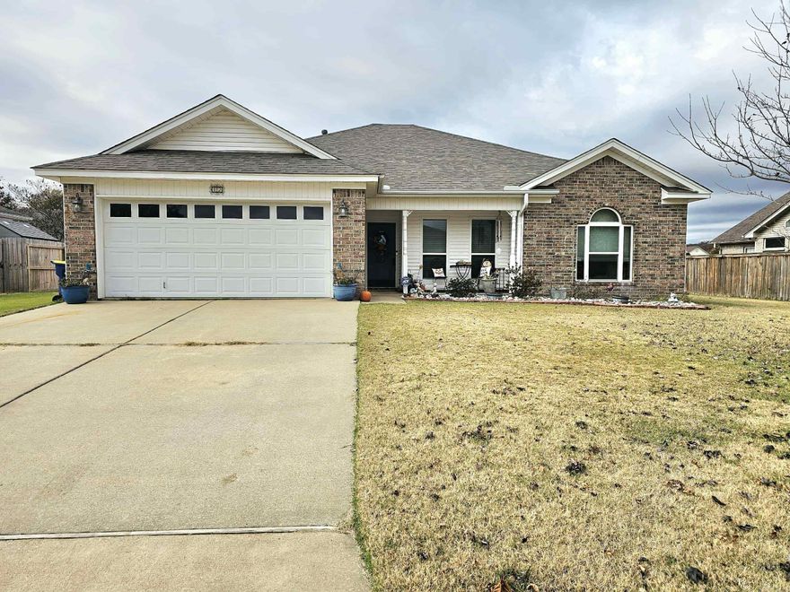 Beautiful 4-bedroom, 2-bath home in the desirable Magness Creek Subdivision, featuring a split floor plan and an inviting open-concept kitchen, dining, and living area. The kitchen offers ample cabinetry for storage, a breakfast bar, and appliances including a stove, microwave, and dishwasher. The living area features a cozy fireplace with gas logs, and a separate laundry room adds convenience and efficiency. The spacious primary suite is tucked away on its own private side of the home and includes a walk-in shower, jetted tub, double vanities, and a walk-in closet. A 2-car garage provides extra storage and parking options. Step outside to a large fully fenced backyard with a patio—perfect for relaxing or entertaining. Magness Creek offers a wide array of community amenities, including tennis, basketball, and volleyball courts; playgrounds; fishing docks; picnic pavilions; and scenic walking paths with pedestrian bridges connecting both sides of the neighborhood. The subdivision is built around two beautiful lakes—Sunrise and Sunset—and is home to Magness Creek Elementary and Magness Creek Early Learning Center conveniently located at the entrance.