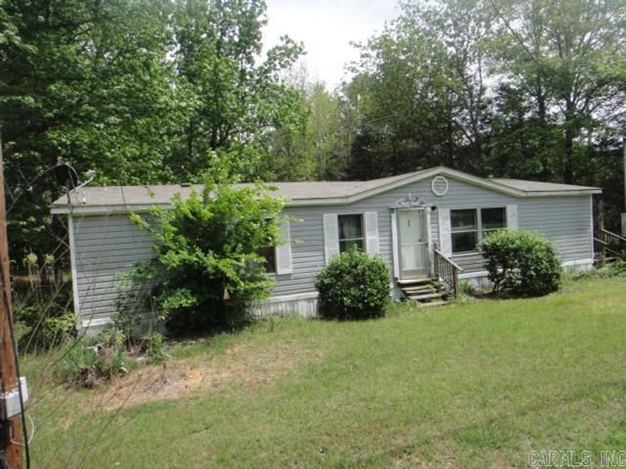A little piece of country living. This 3BR 2BA mobile home has an open floor plan with a large breakfast bar. There is also a Laundry Rm. Primary BA has a garden tub.